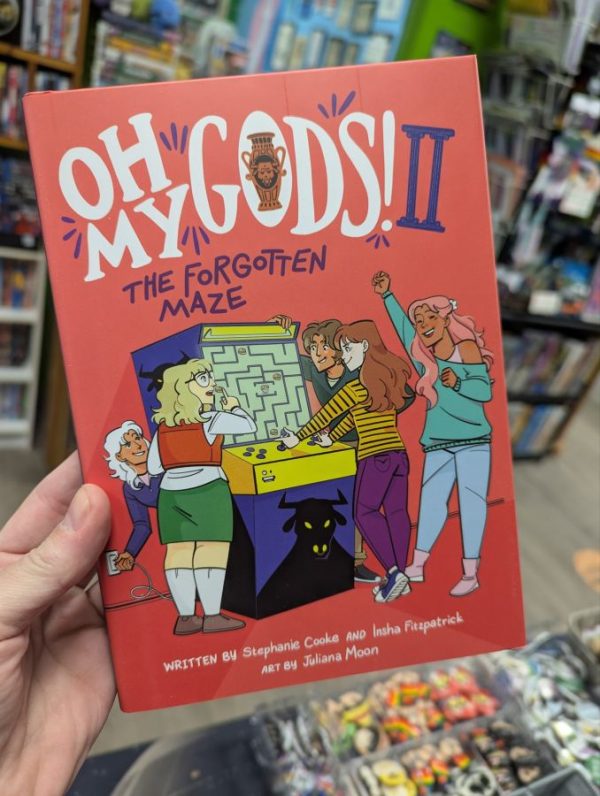 Oh My Gods! II hardcover graphic novel 
by Stephanie Cooke, Insha Fitzpatrick and Juliana Moore